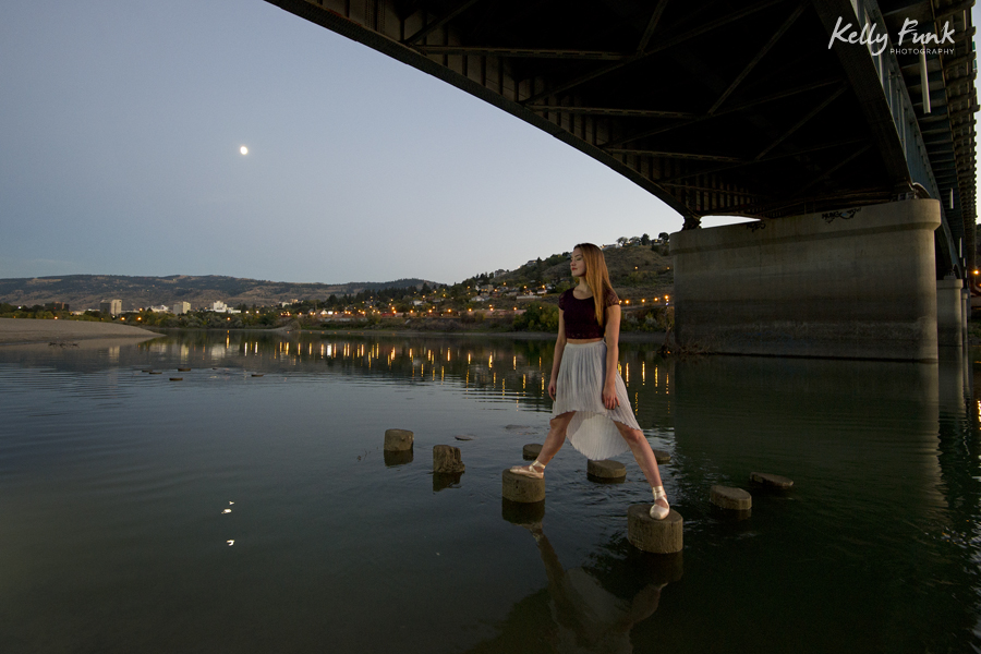 ballet dancer prepping for a photo shoot on the Thompson river, Kamloops, BC, Canada