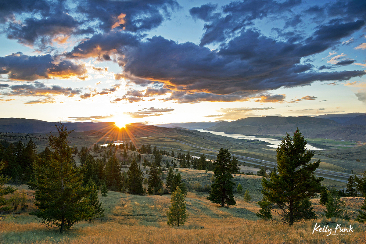 Sunset over highway 5 west of Kamloops in the grasslands, British Columbia, Canada