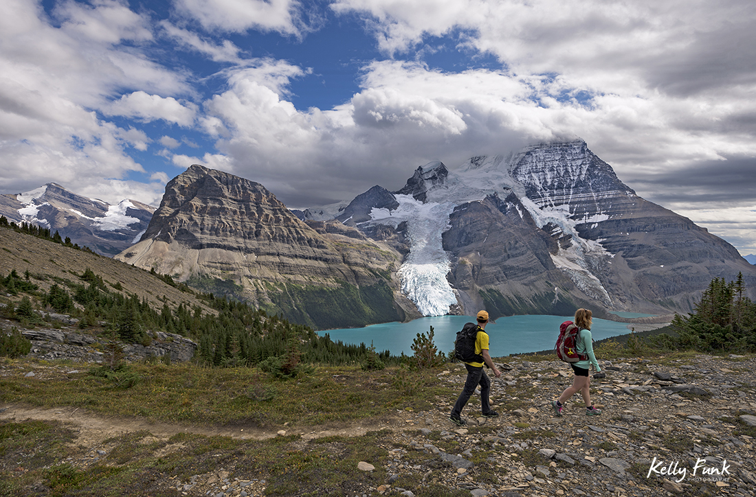 Two hikers make their way up the Mumm basin, Mt. Robson Provincial park, British Columbia, Canada