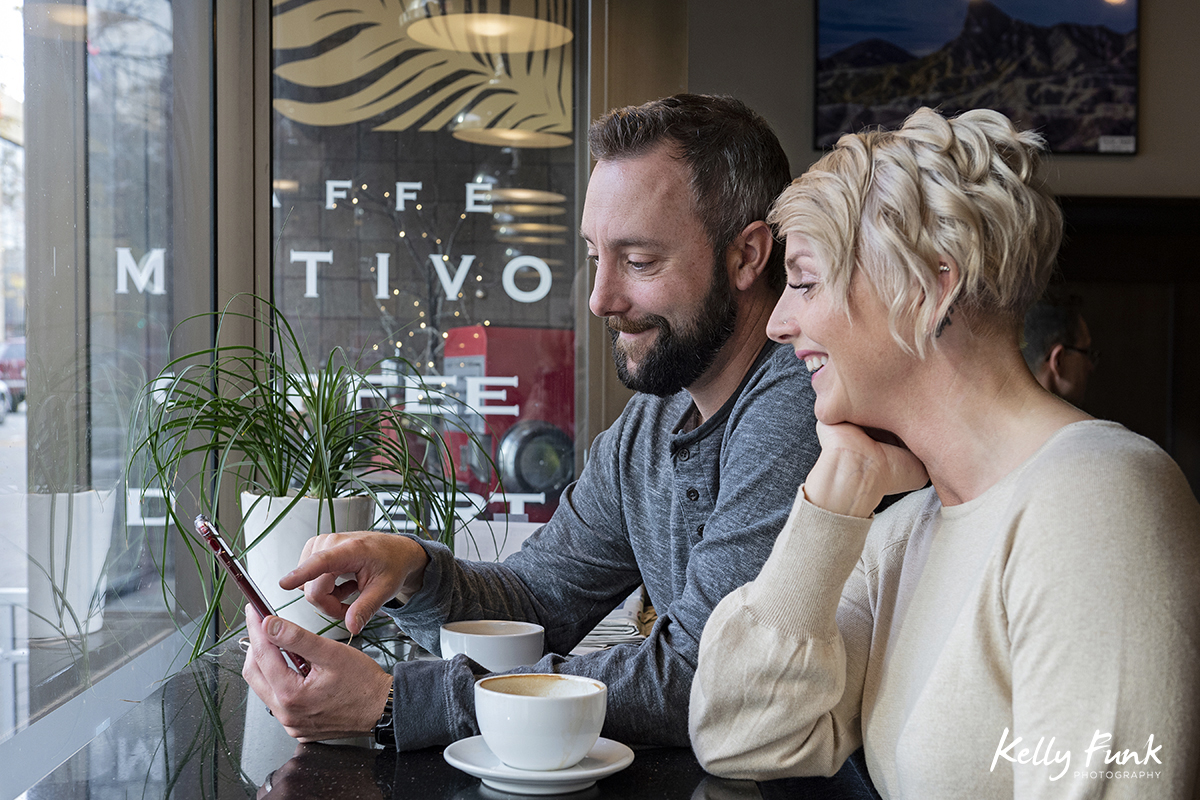 A couple enjoys getting coffee at Caffe Motivo in Kamloops, British Columbia, Canada
