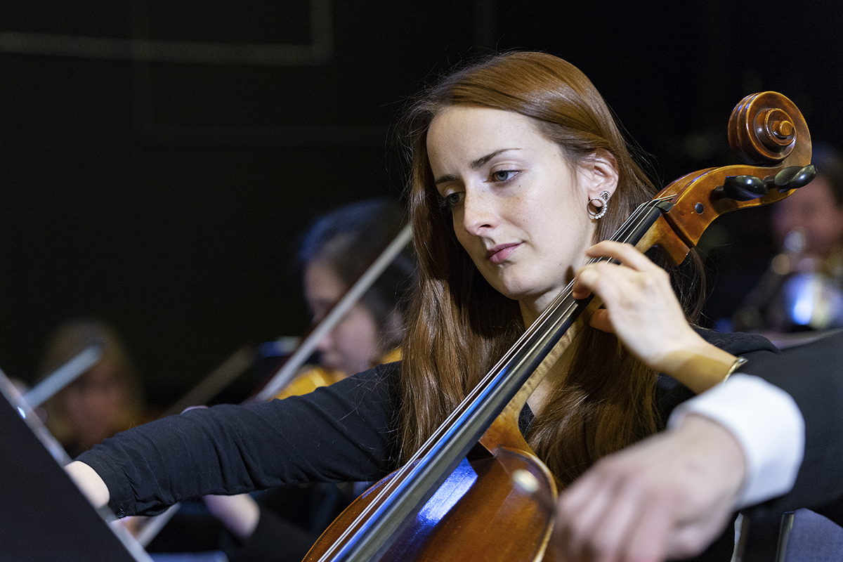 A female cello player with the Kamloops Symphony Orchestra, British Columbia, Canada