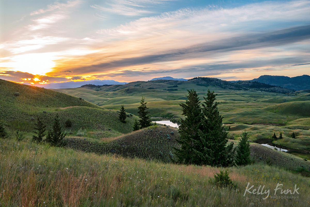 Sunrise bursts onto the Kamloops landscape at the Lac Du Bois grasslands, Thompson Okanagan region, British Columbia, Canada